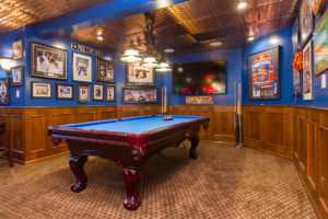 basement-development-with-a-wet-bar-and-games-area