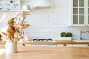 Kitchen wooden table top and kitchen blur background interior style
